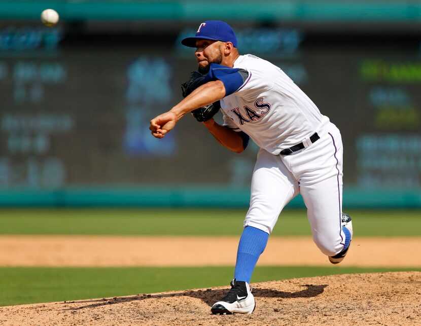 Texas Rangers relief pitcher Dario Alvarez (39) closes out the ninth inning against the...