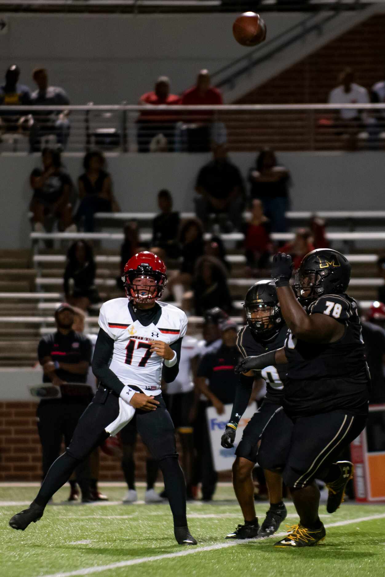 Cedar Hill junior Anthony Edwards (17) throws a pass during a District 11-6A high school...