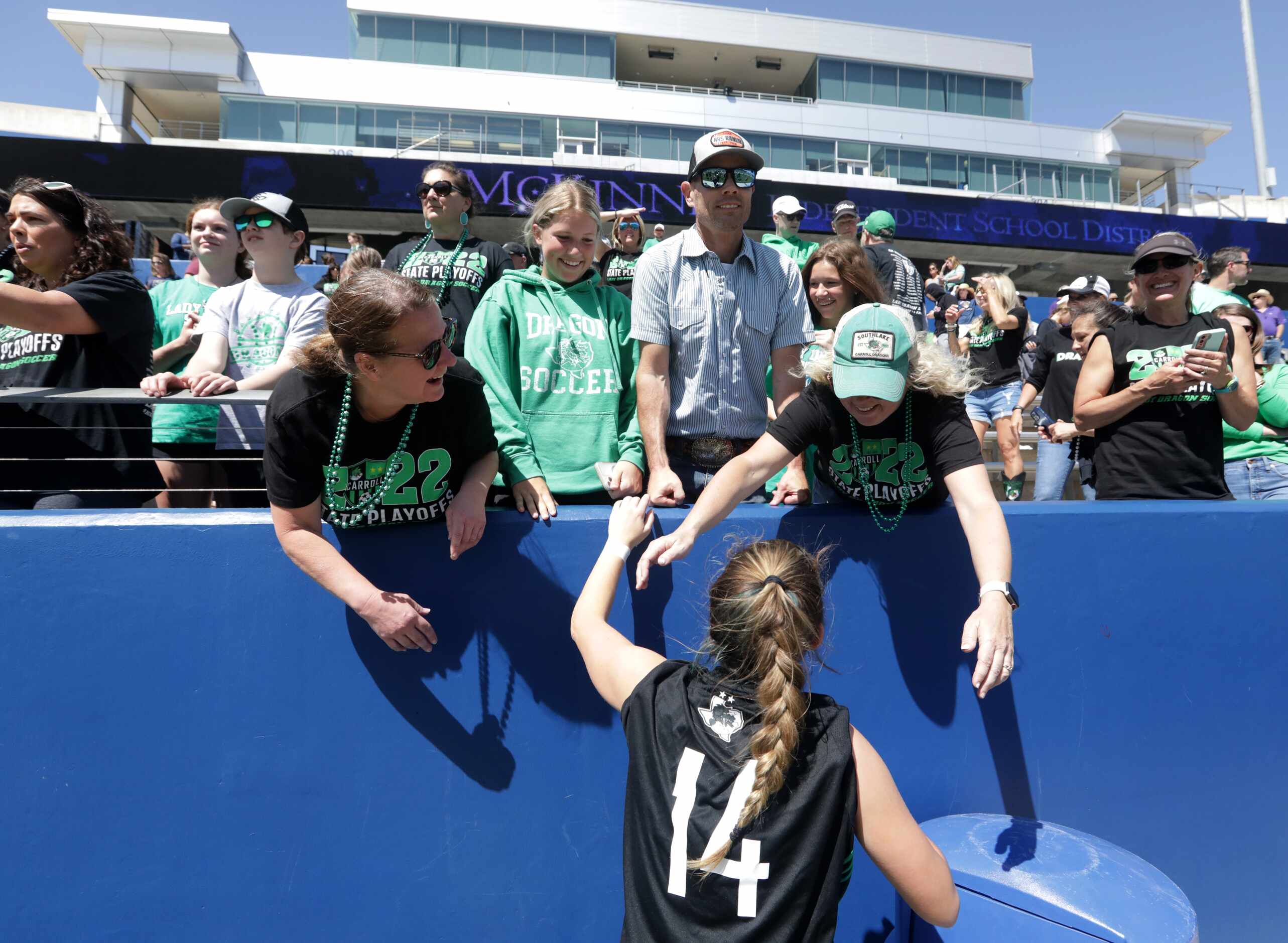 Southlake Carroll player #14, Kaylie Harris, greets friends and family after winning a Class...