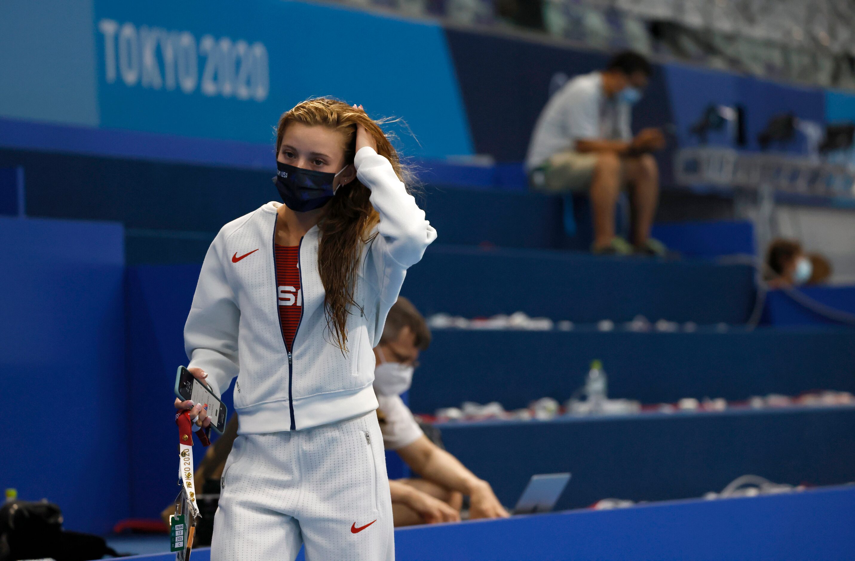 USA’s Hailey Hernandez makes her way towards coaches after finishing up with interviews with...