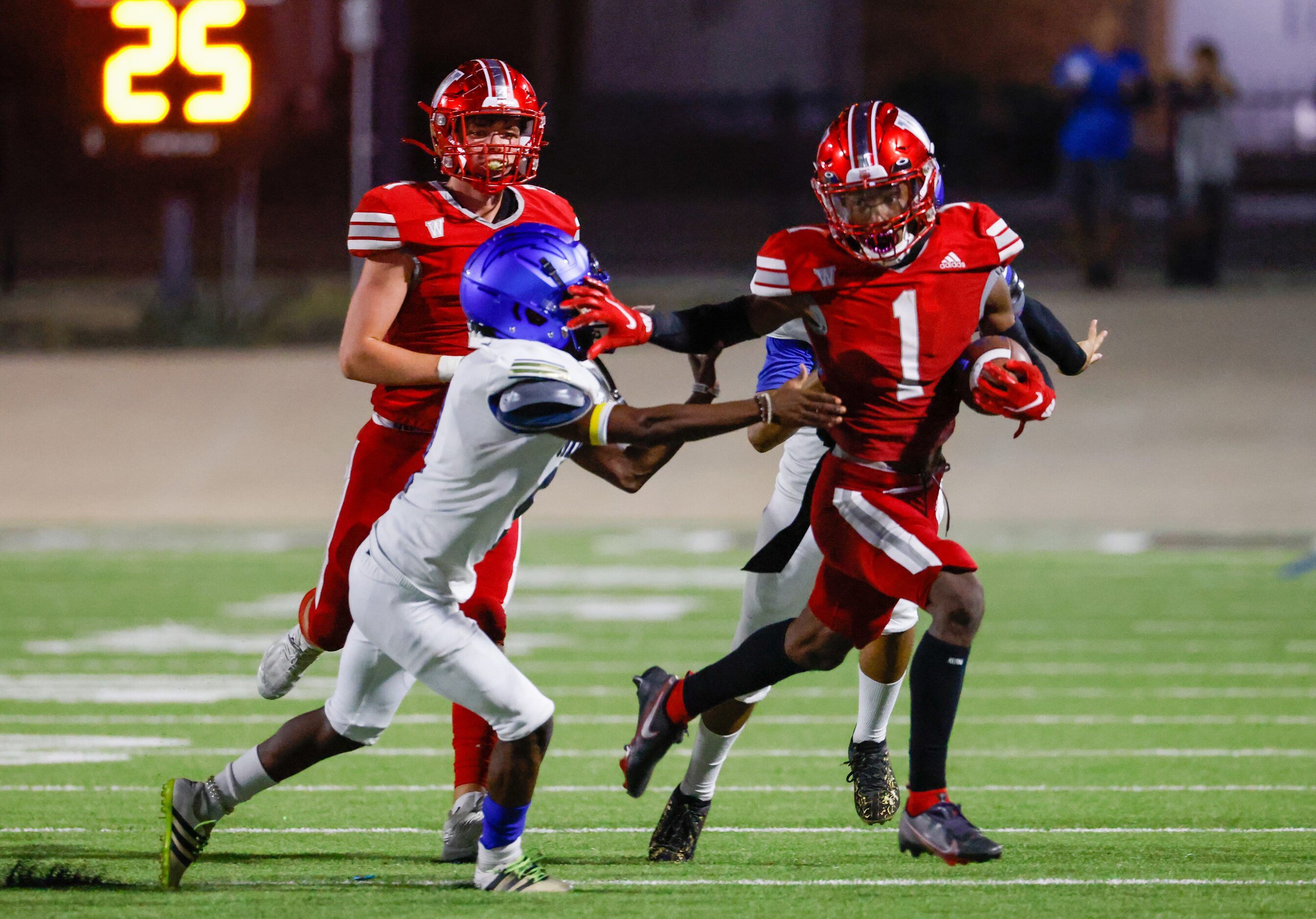 Woodrow Wilson wide receiver Cyris Taylor (1) runs past Conrad defense for a touchdown...