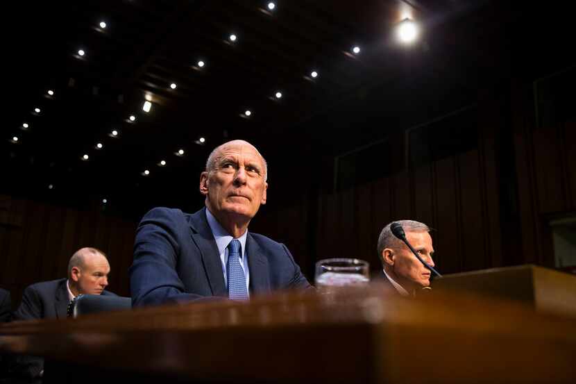 Dan Coats, the director of national intelligence, testifies on Capitol Hill in Washington on...