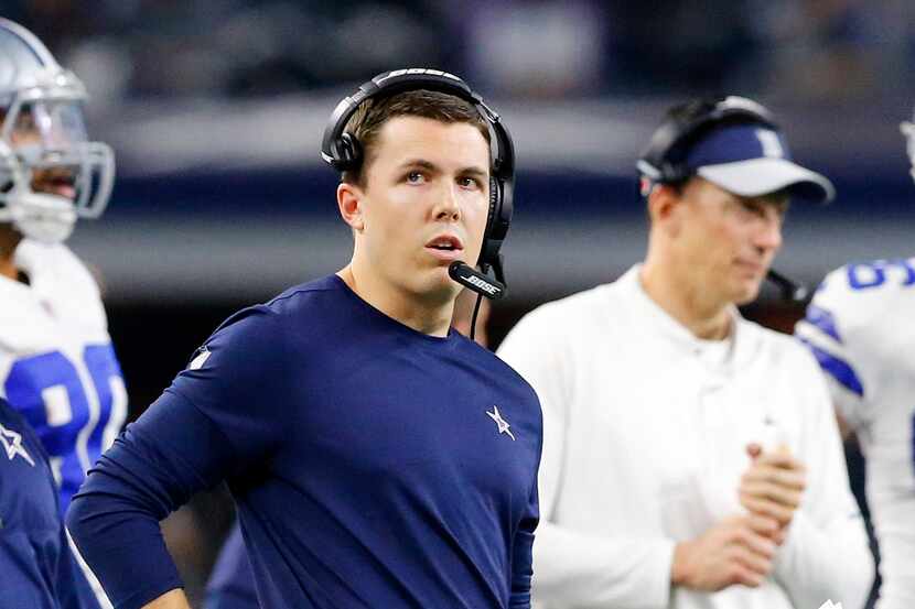Dallas Cowboys quarterbacks coach Kellen Moore is pictured on the sideline in overtime...