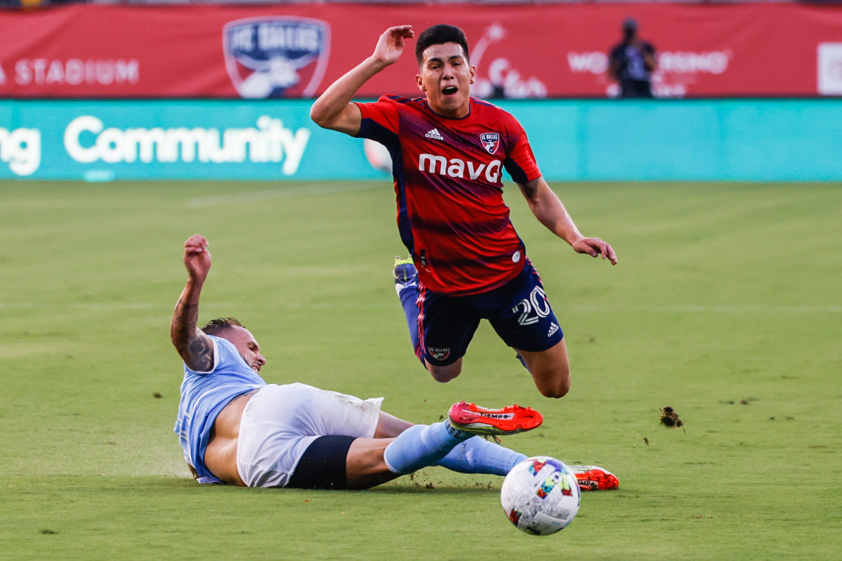 New York City defender Maxime Chanot (4) fouls FC Dallas forward Alan Velasco (20) during...