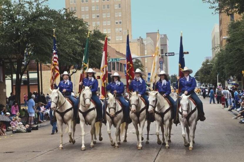 
A mounted color guard leads the West Texas Fair’s parade.
