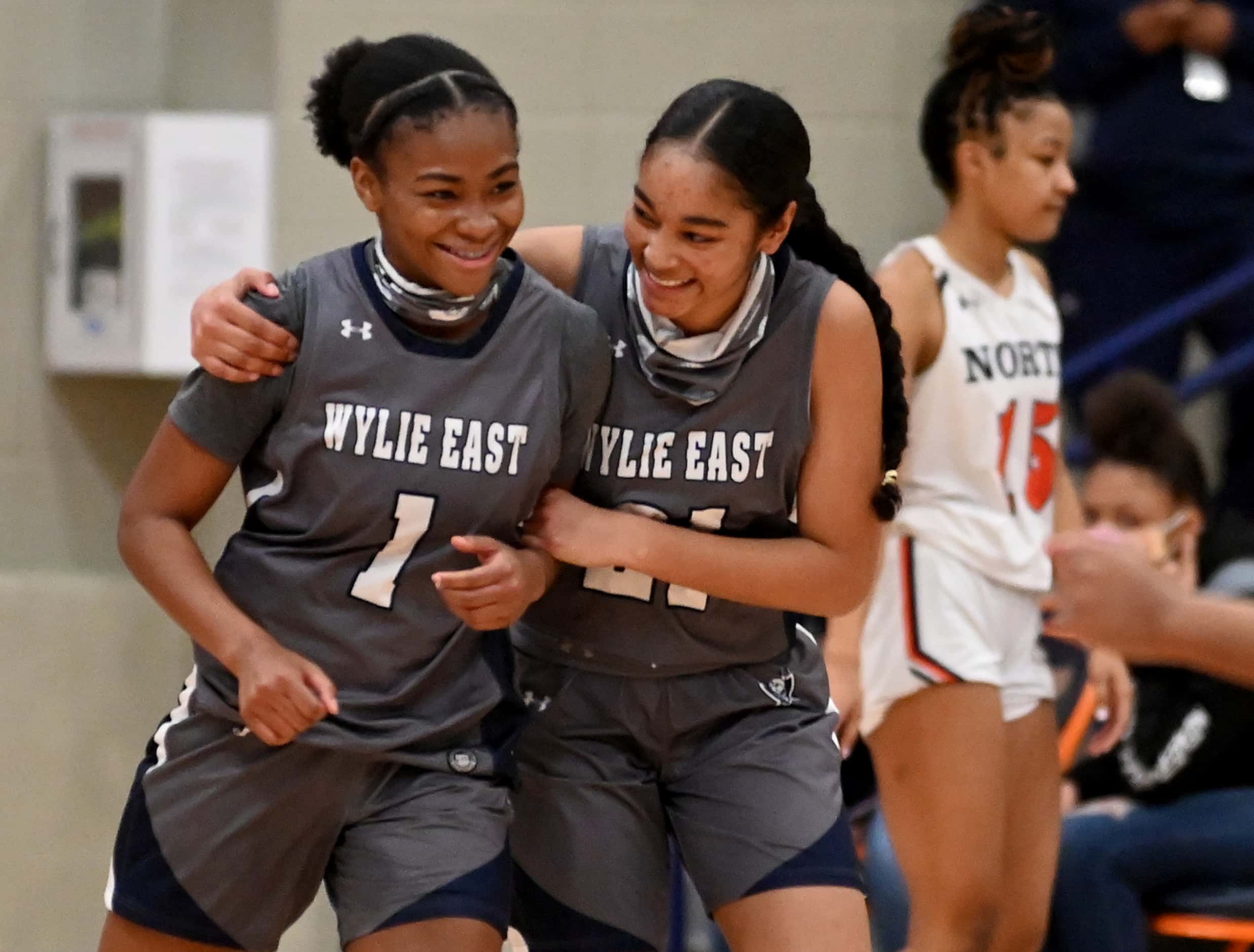 Wylie East’s Taylor Dailey (1) and Aleena Dawkins celebrate their double overtime win during...
