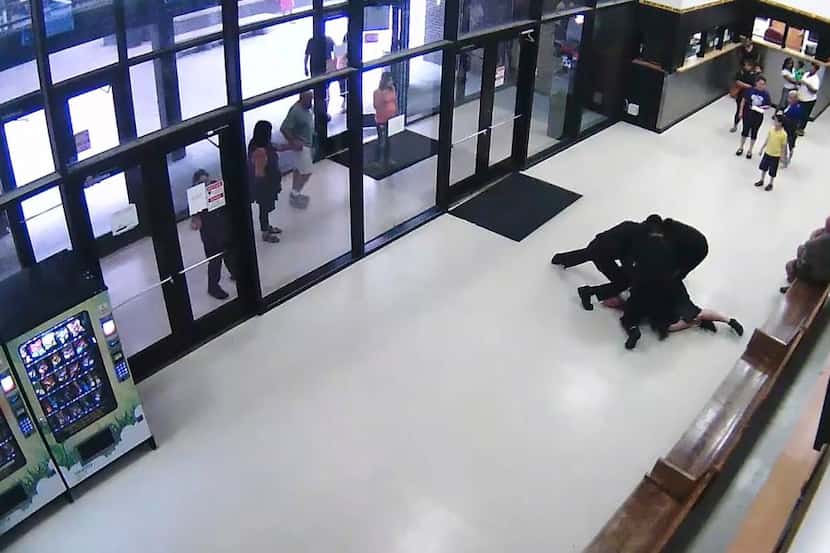 
A scene from a jailhouse lobby security camera at Dallas County’s Lew Sterrett Justice...