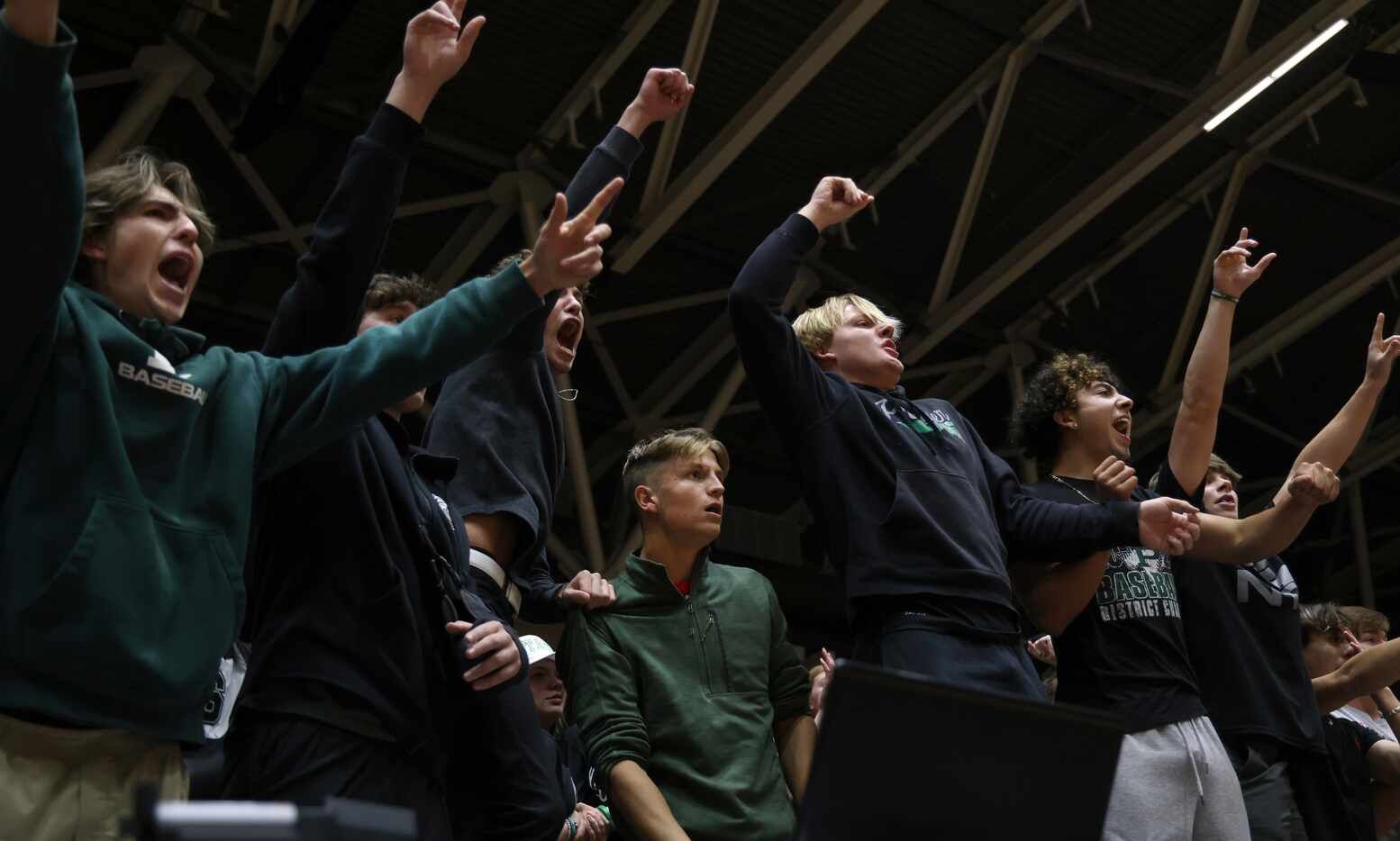 Prosper fans in the student section voice their spirit and support during the first set of...