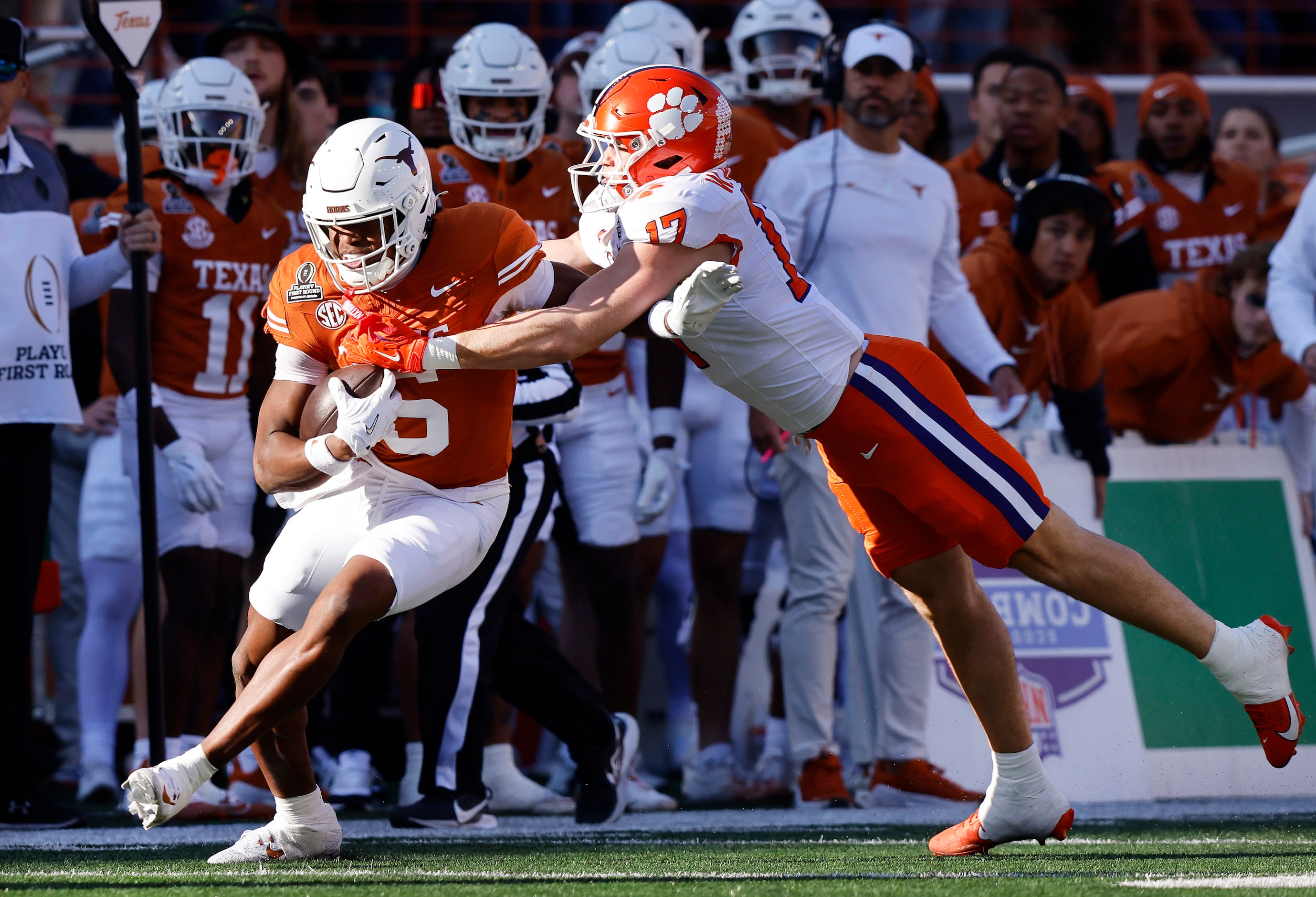 Clemson Tigers linebacker Wade Woodaz (17) makes a diving tackle attempt on Texas Longhorns...