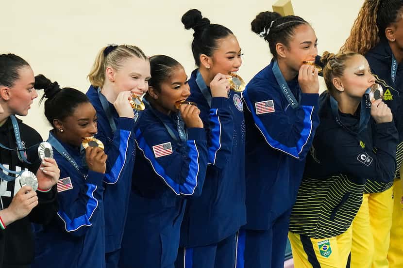From left, Simone Biles, Jade Carey, Jordan Chiles, Suni Lee and Hezly Rivera of the United...