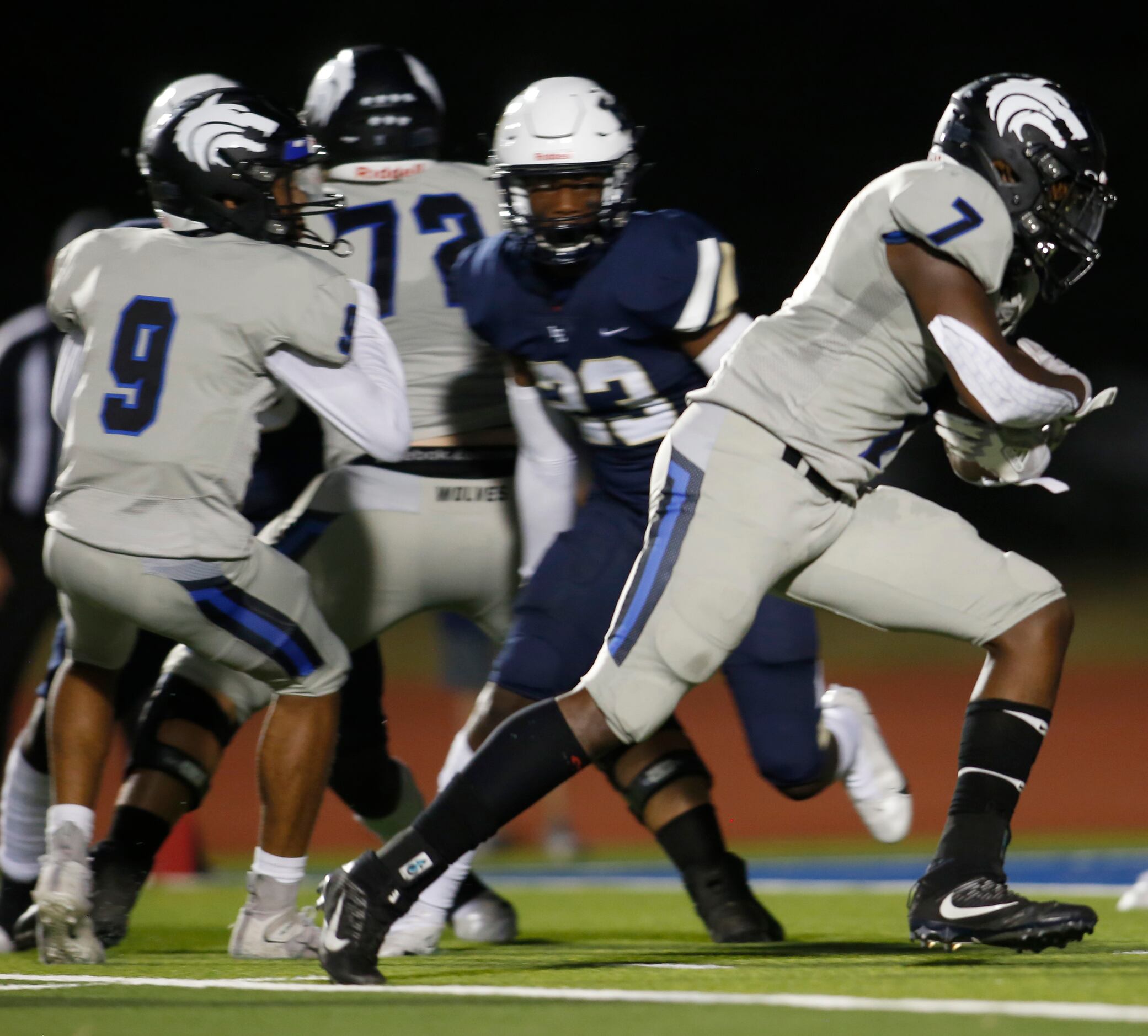 Plano West running back Tabren Yates (7) bolts into the end zone for a rushing touchdown...
