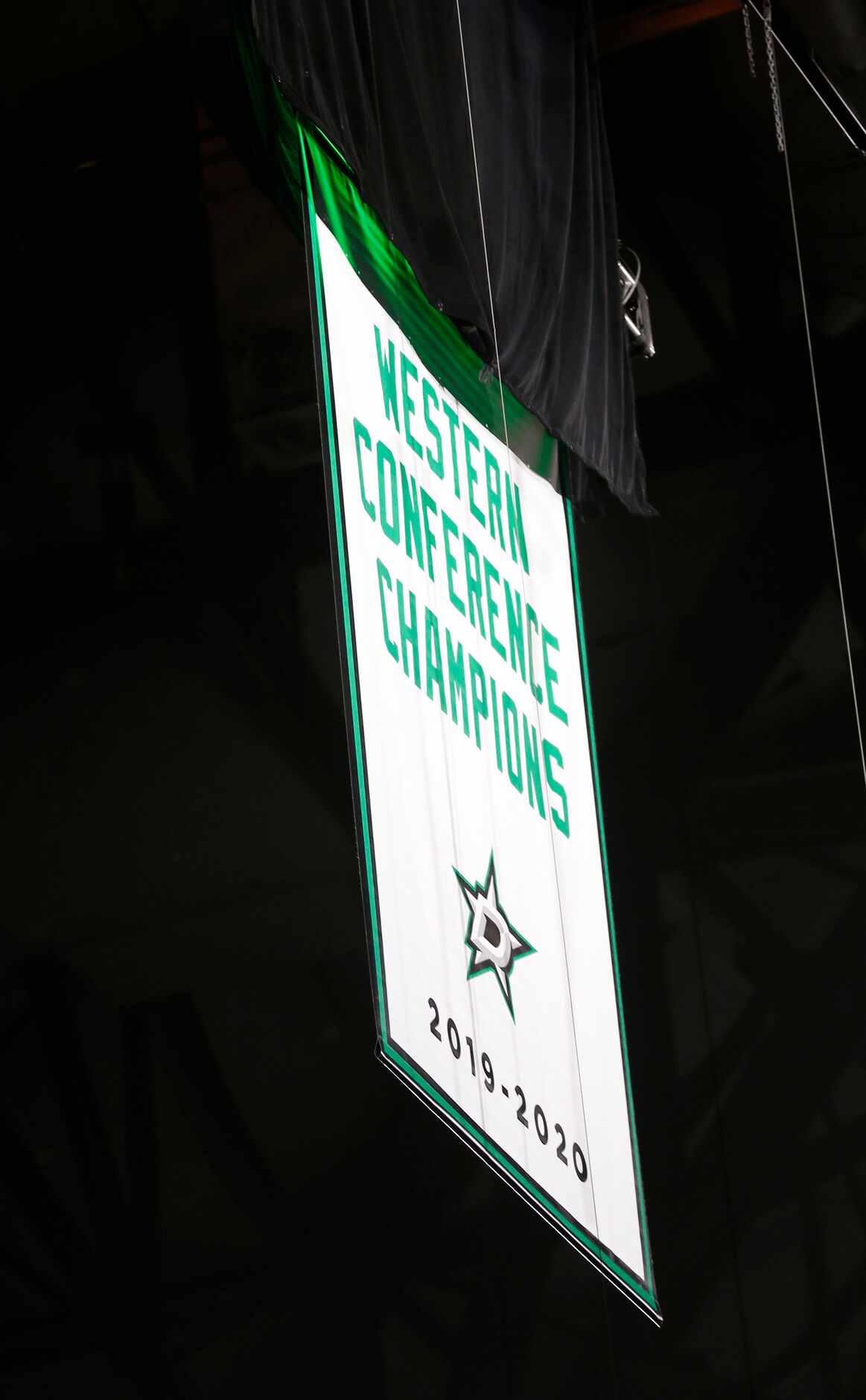 The Western Conference Champions banner is unveiled prior to the start of the game between...