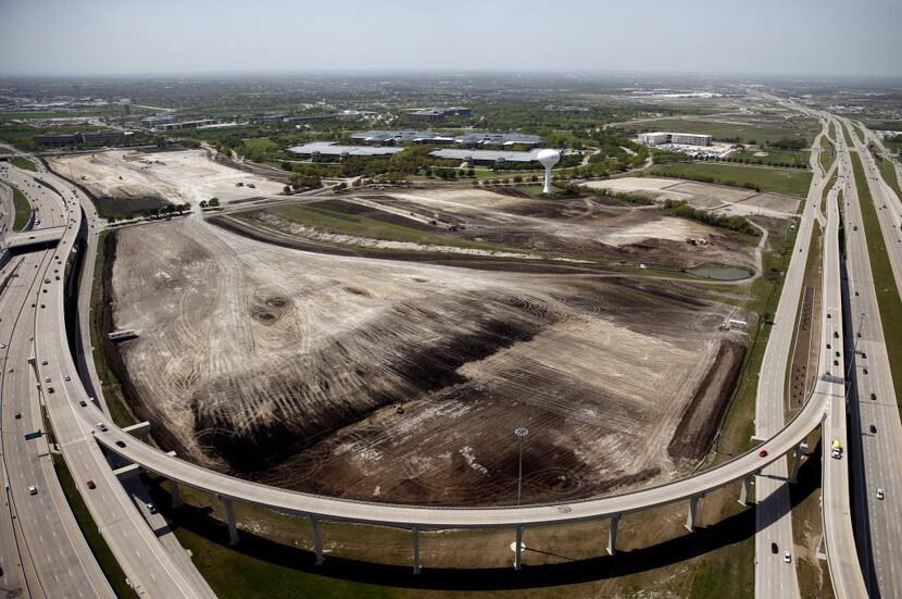 The 178-foot-tall tower was built in 1985 to serve Legacy business park. A demolition team...