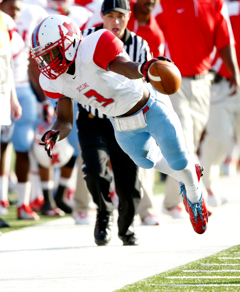 Skyline's Ellis Onic (3) leaps in an attempt to get more yards in a game against Allen...