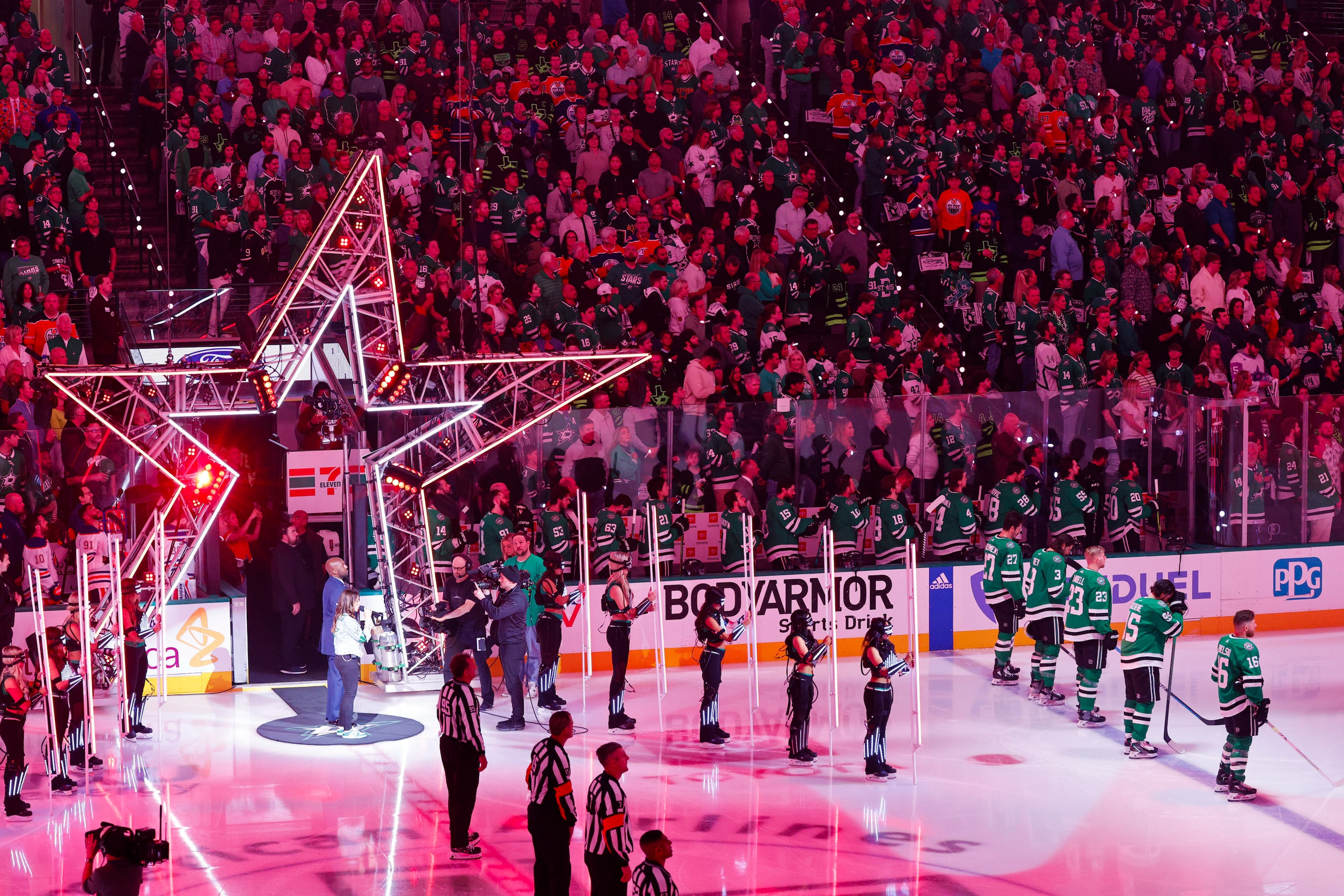 Players line up for the national anthem before Game 2 of the NHL hockey Stanley Cup Western...