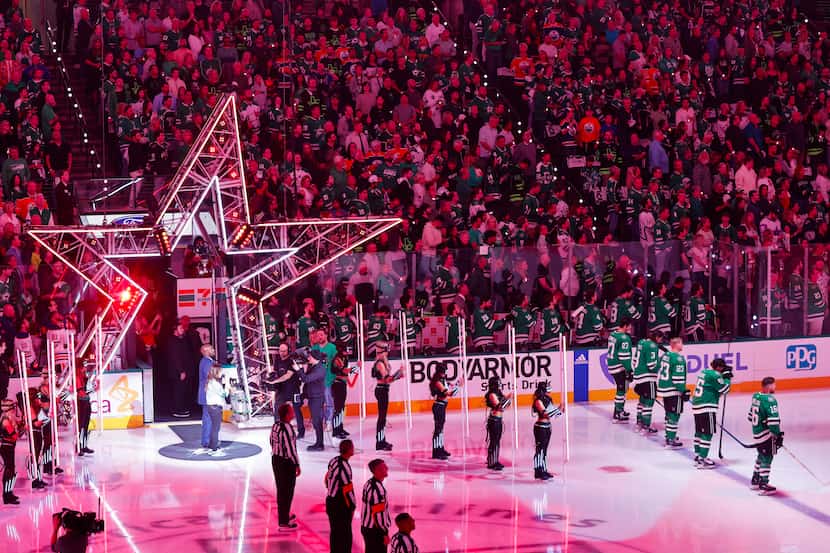 Players line up for the national anthem before Game 2 of the NHL hockey Stanley Cup Western...