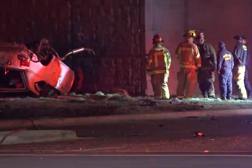 First responders at the scene of a fatal crash involving a suspected drunken driver at the...
