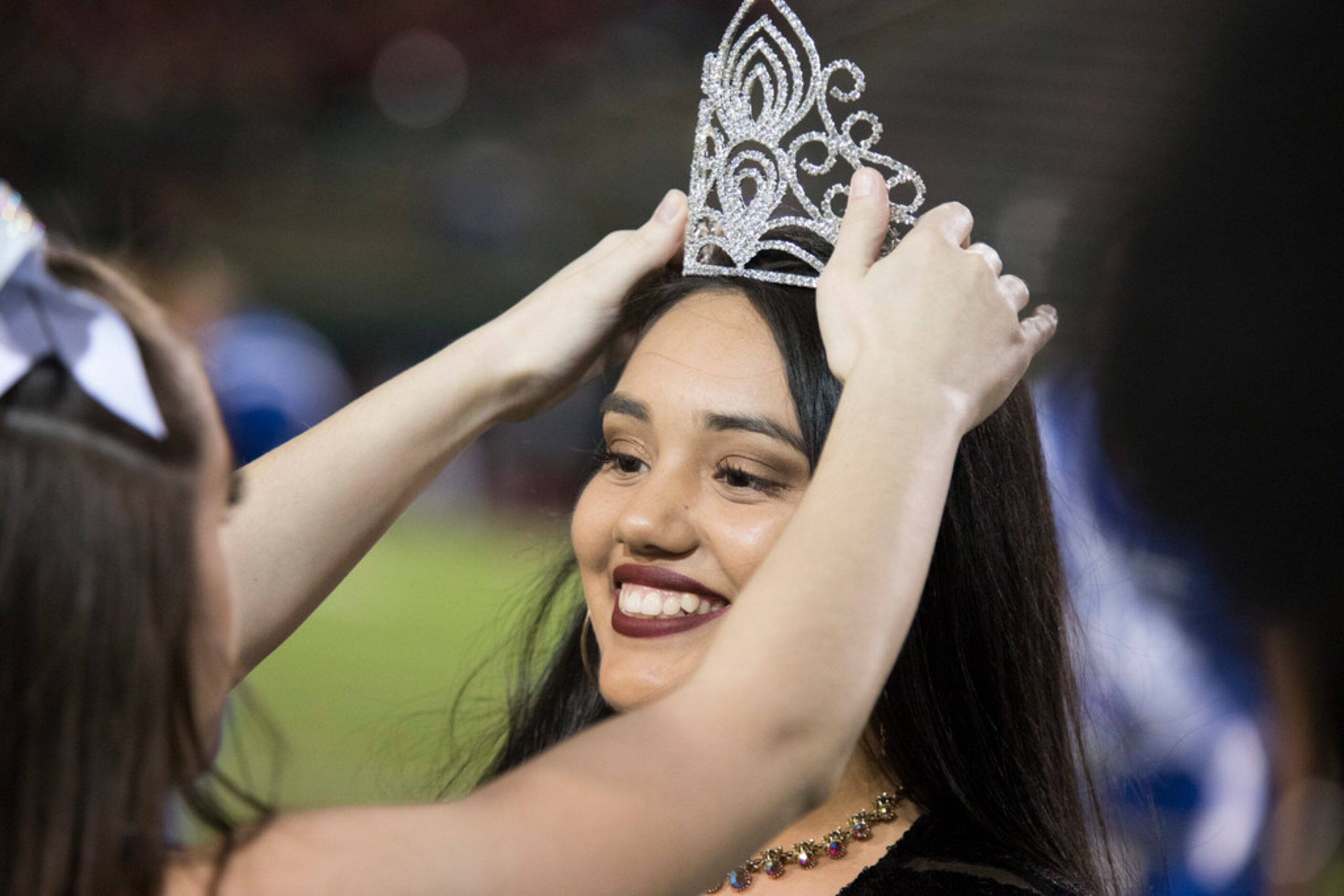 Grand Prairie's Valaria Medellin is crowned Homecoming Queen during a District 7-6A matchup...