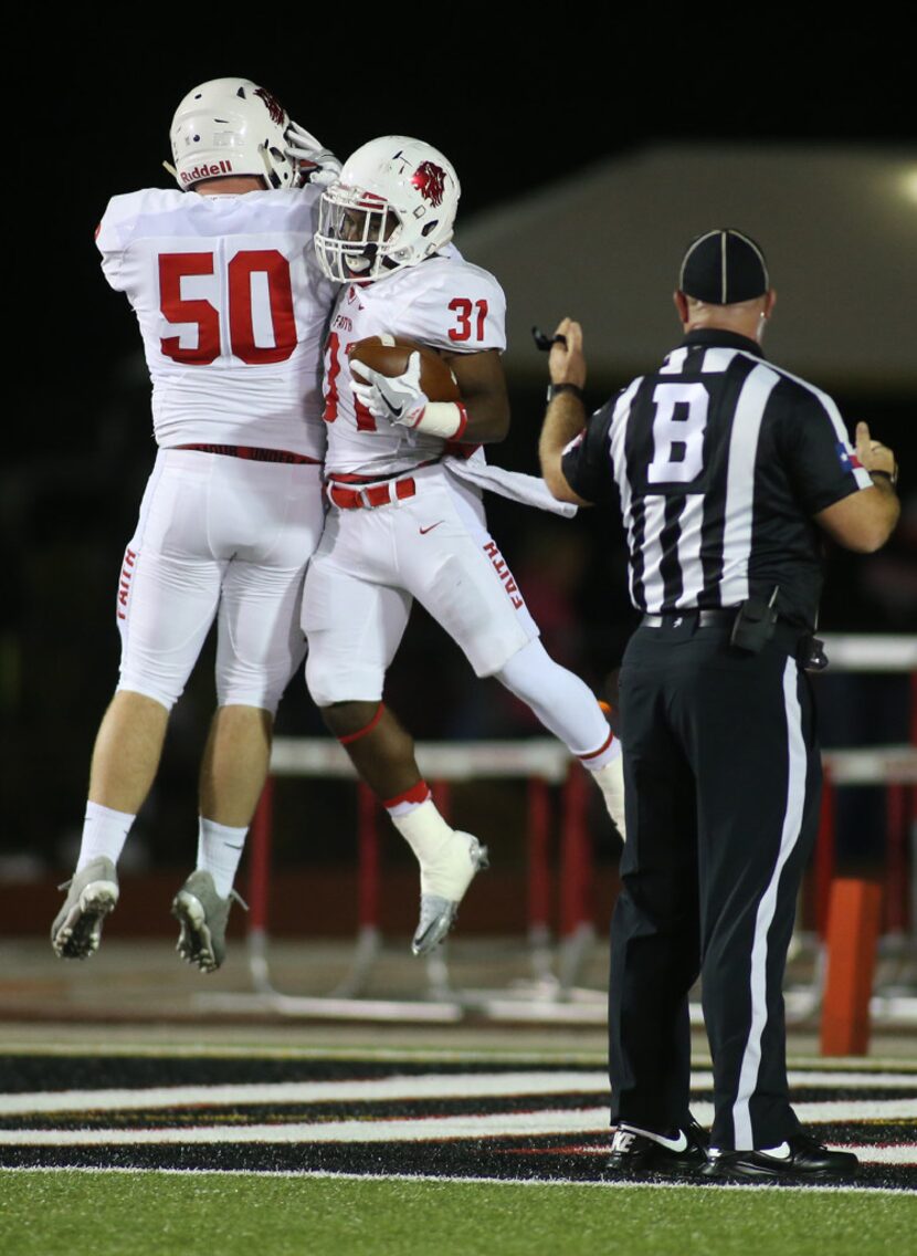 Grapevine Faith's Keyshawn Wyatt ( 31) celebrates a touchdown against Fort Worth Christian...