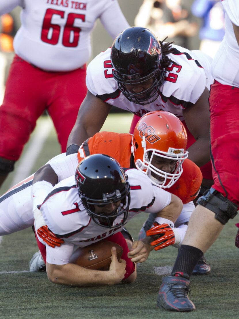 Nov 17, 2012; Stillwater OK, USA; Texas Tech Red Raiders quarterback Seth Doege (7) is...