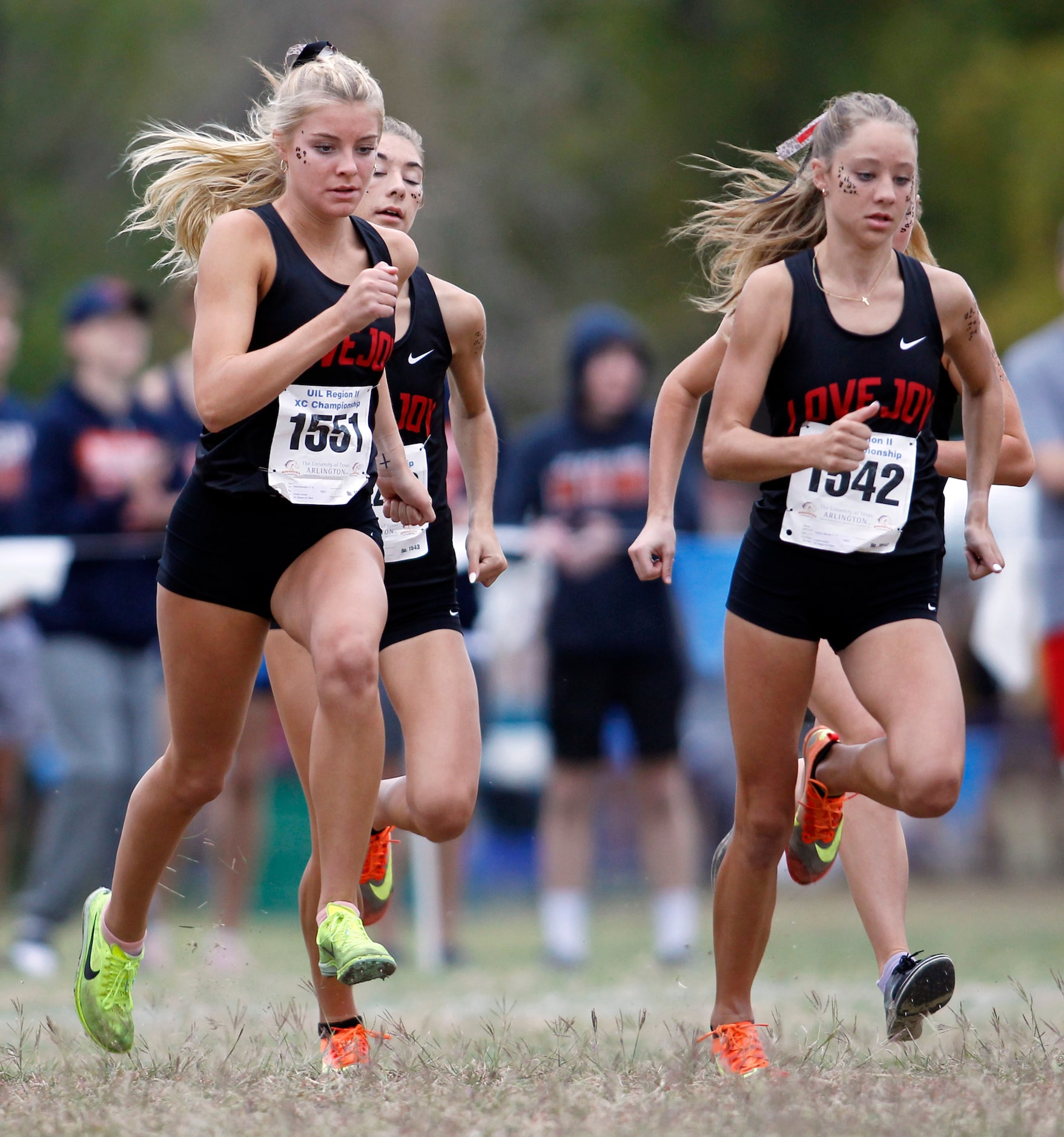 Lucas Lovejoy senior Sara Morefield (1551), left, and sophomore teammate Camryn Benson...