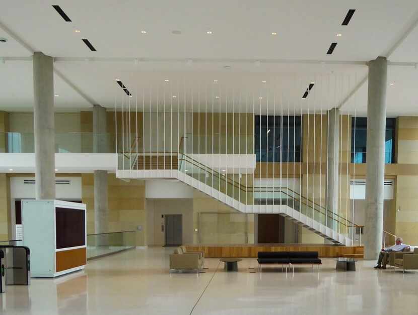 A staircase in the main lobby. Stairs are centrally located throughout to encourage...