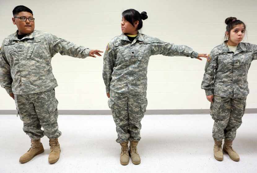 
Leadership Cadet Corps Christian Recinon (from left), Jennifer Hernandez and Amy Ruano...