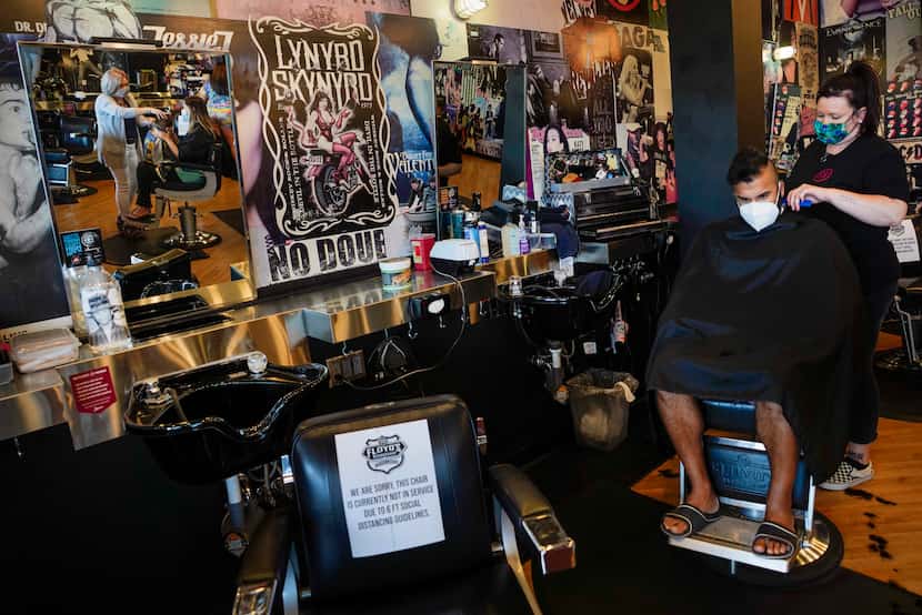 Abid Kabani had his hair cut by stylist Jackie Tomberlin at Floyd's 99 Barbershop in...