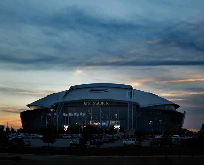 AT&T Stadium is seen at sunset before the Dallas Cowboys Washington Redskins game, Monday,...