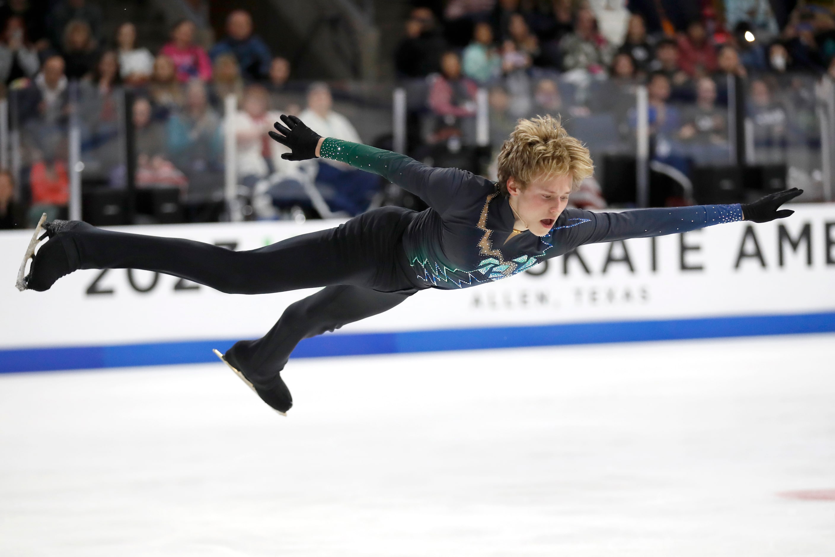 Ilia Malinin, of the United States, competes in the men's free skate program during the...