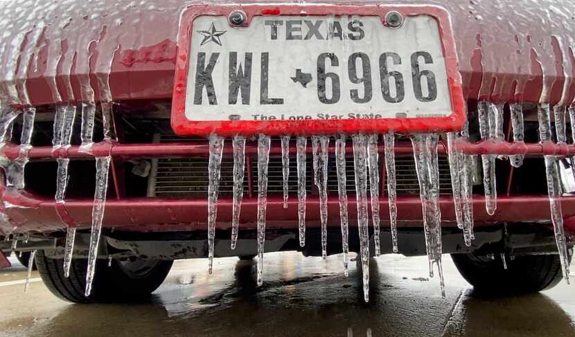 Icicles slowly melted from a car in the Kroger parking lot at 3939 Frankford Road on...