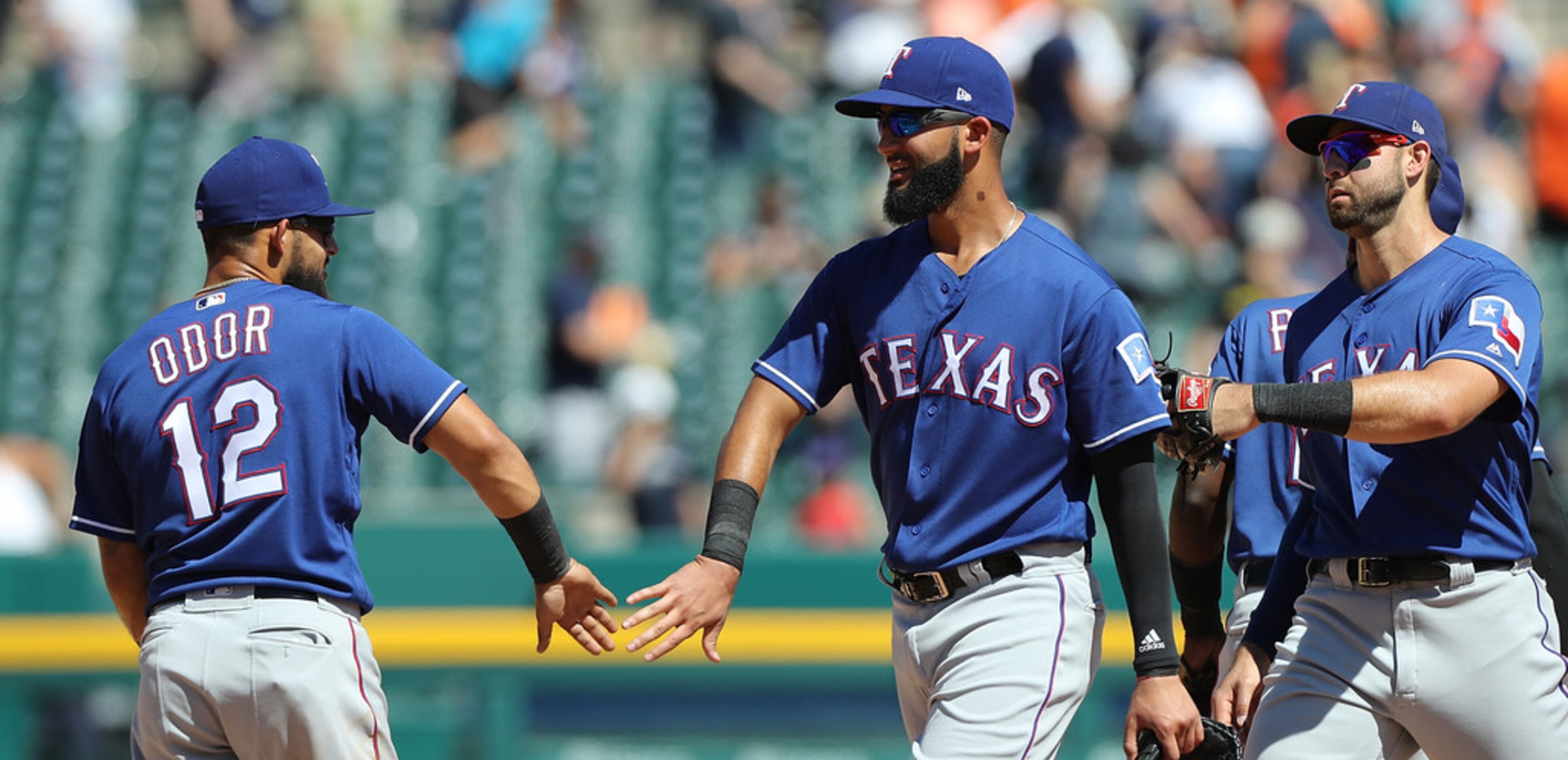 DETROIT, MI - JULY 8: Rougned Odor #12 and Nomar Mazara #30 of the Texas Rangers celebrate a...