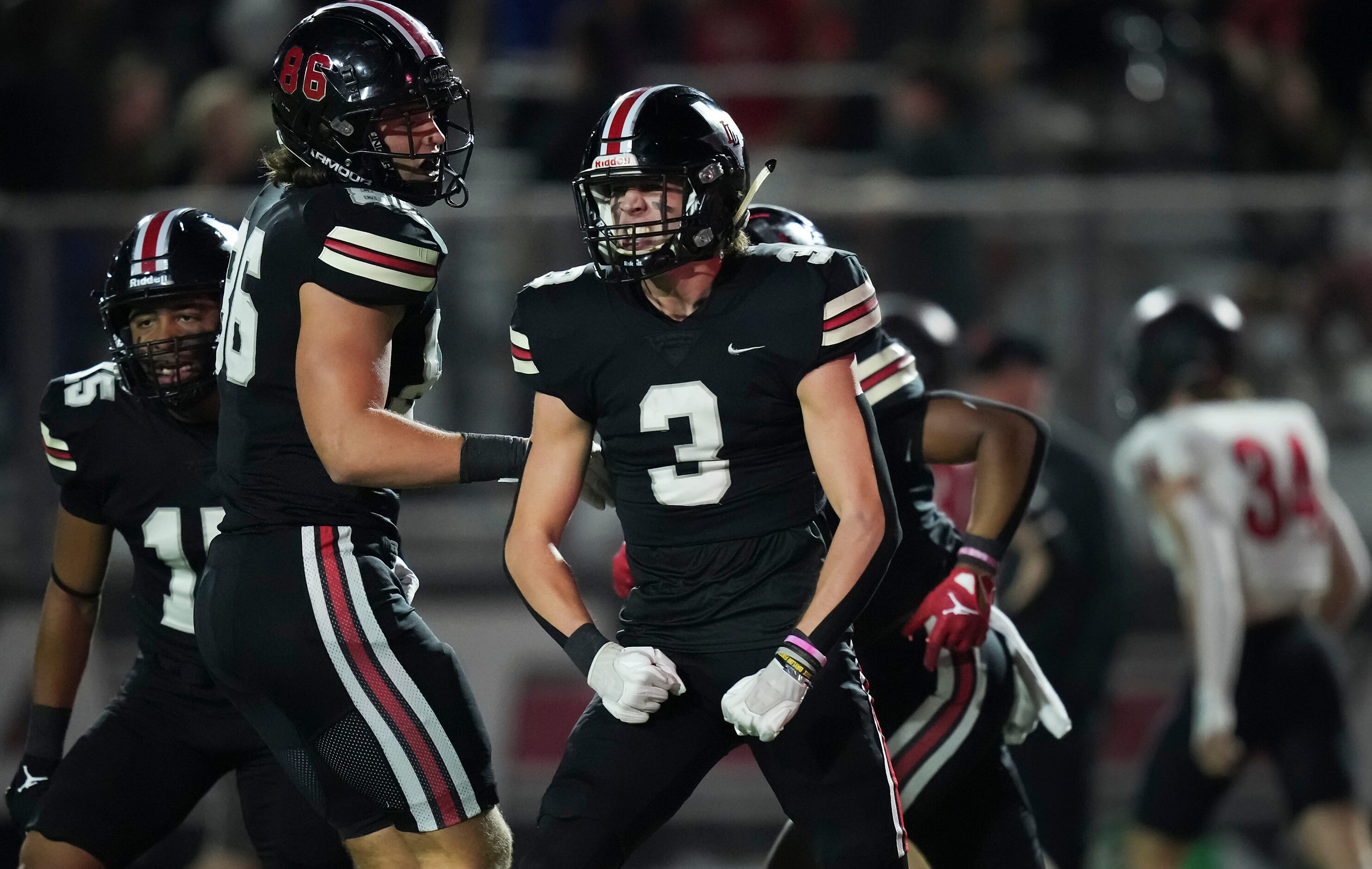 Lovejoy wide receiver Parker Livingstone (3) celebrates after returning the opening kickoff...