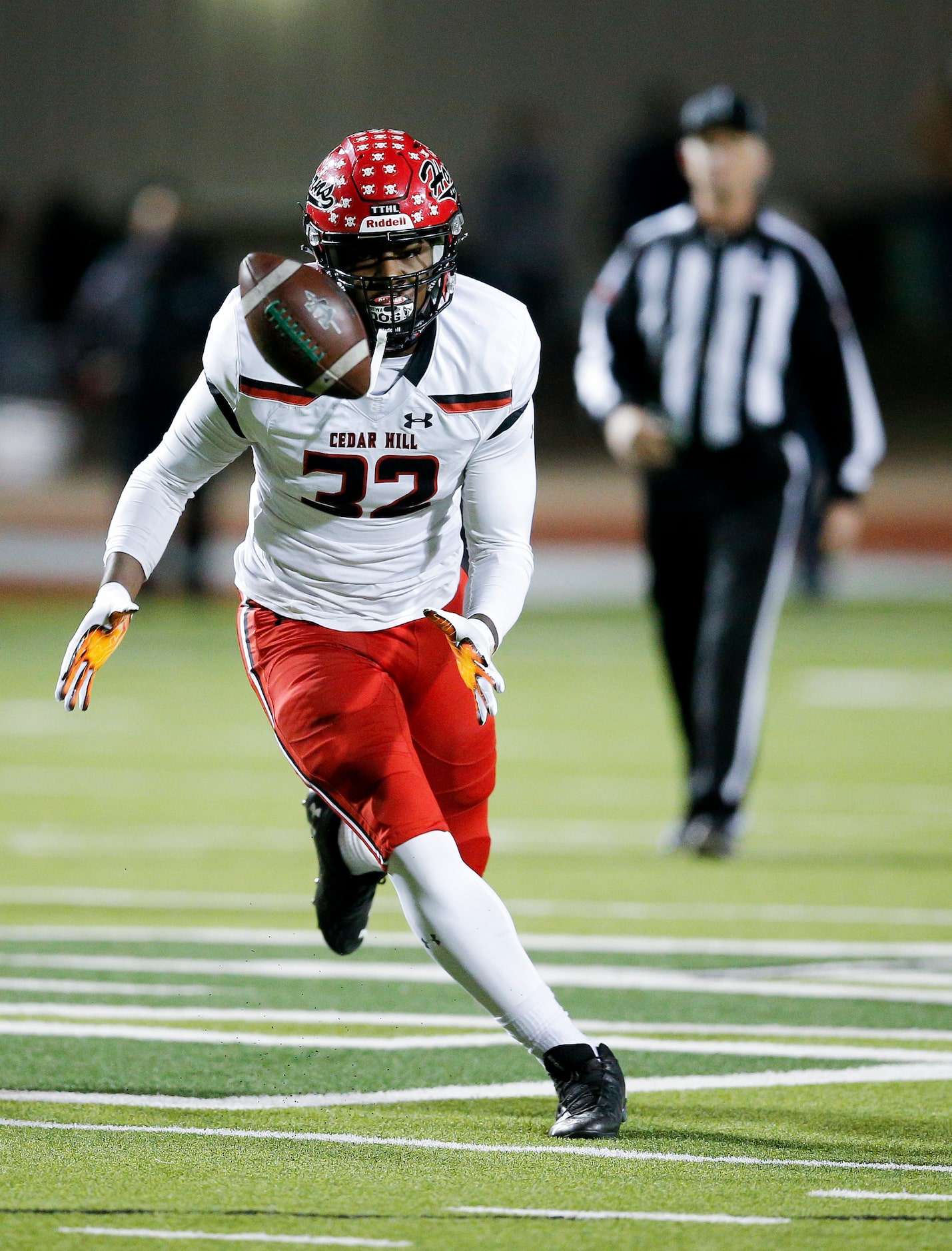 Cedar Hill senior defensive end Charles Esters III (32) chases after a pass he batted down...