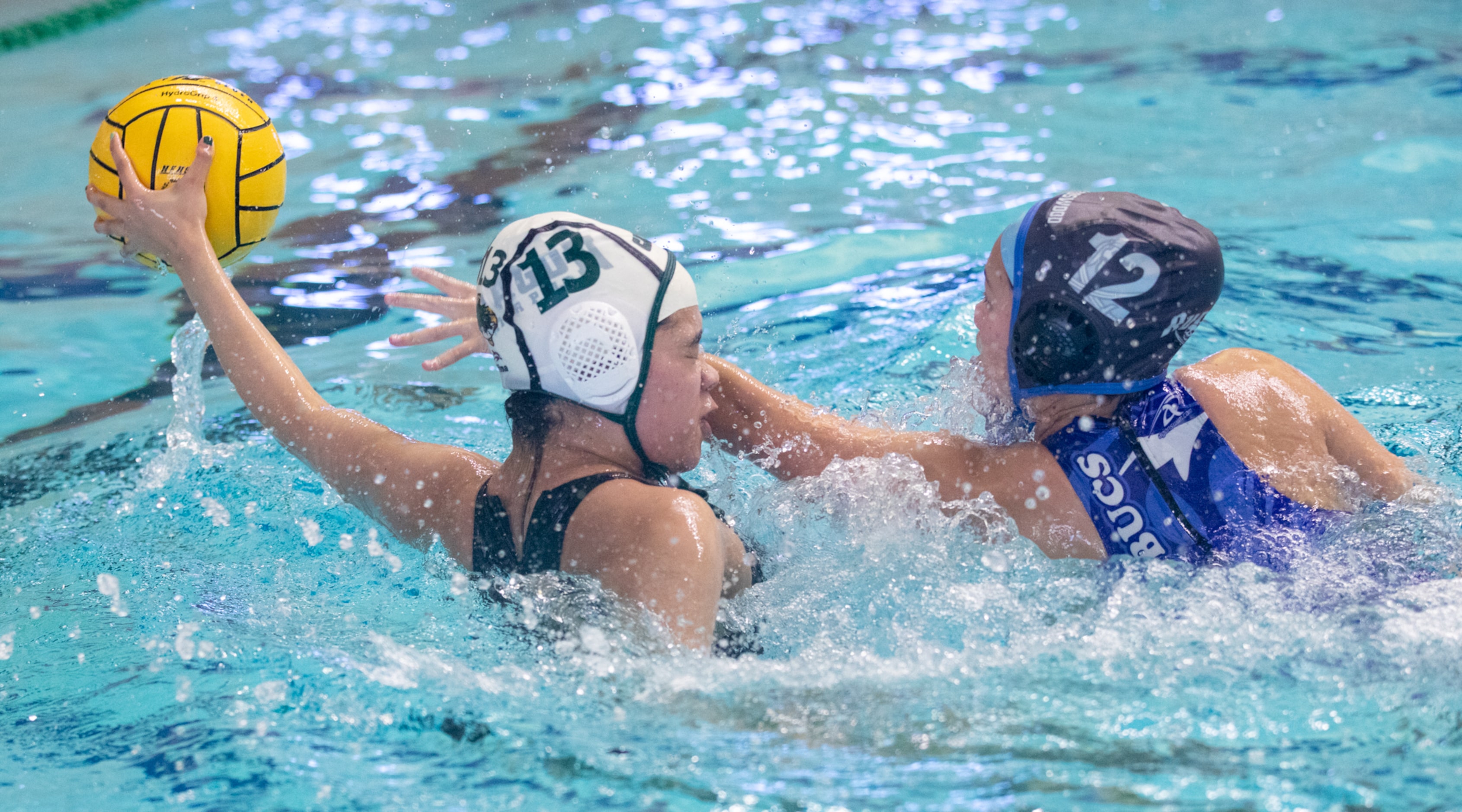 Clute Brazoswood defender Therese Braun, right, pressures Southlake Carroll attacker Ella Le...