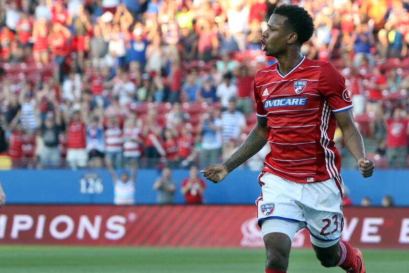 FC Dallas midfielder Kellyn Acosta (23) ignites the home crowd as he celebrates after...