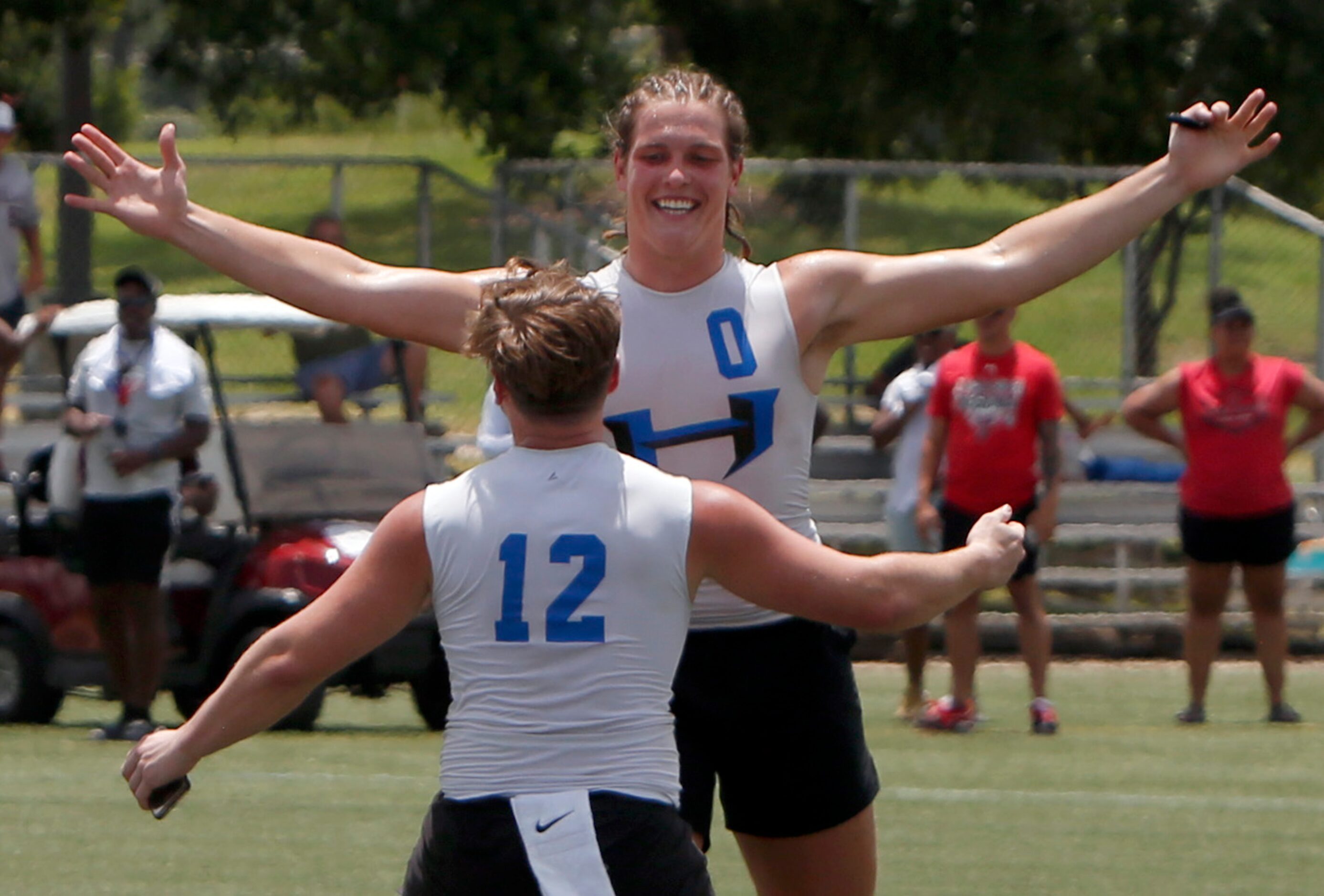 Hebron Hawks Carter Brock (0) and Chris Workley (12) celebrate after the team's 28-26...