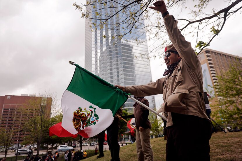 A man that goes by the name Tejas Mojado leads a group of 200 people that rallied and then...