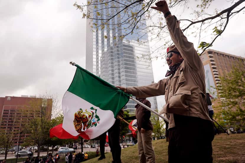 A man that goes by the name Tejas Mojado leads a group of 200 people that rallied and then...