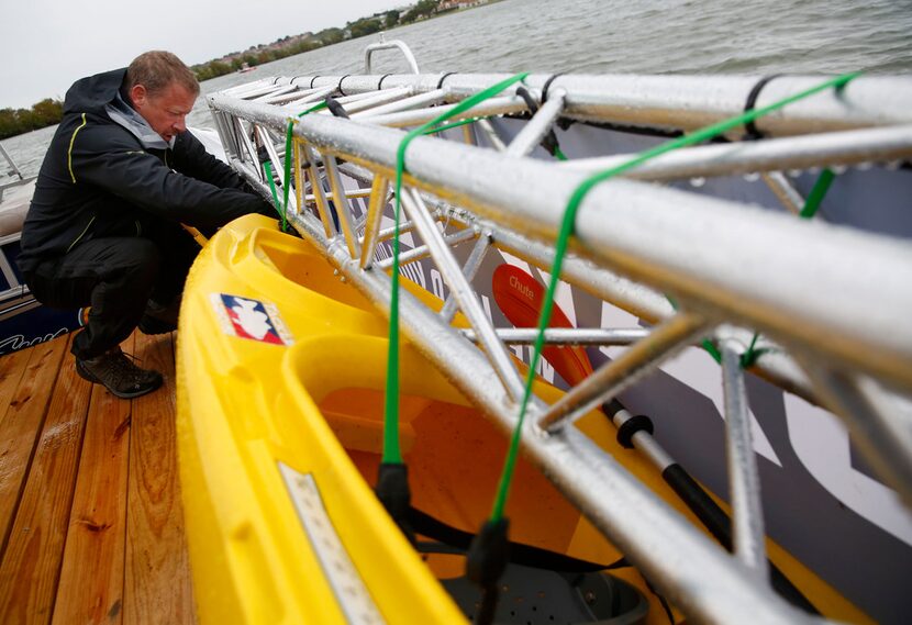 Todd Phillips, founder and director of the Last Well, prepares to gas up his generator on...