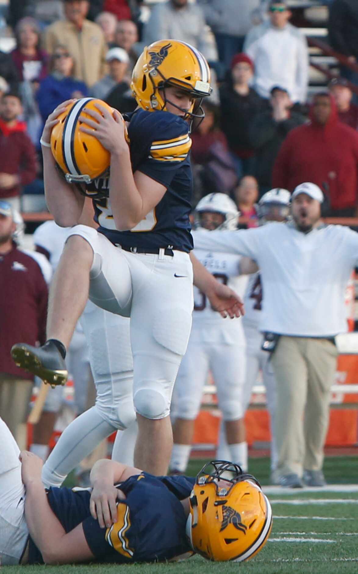 Arlington Lamar kicker Blake Ford (23) reacts after missing an extra point attempt during...