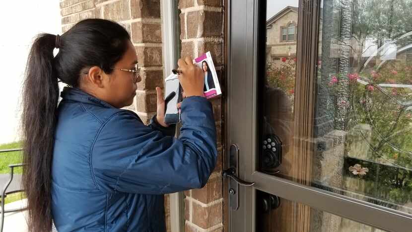 Congressional candidate Jessica Cisneros leaves a flyer at a home in Live Oak, Texas, on...