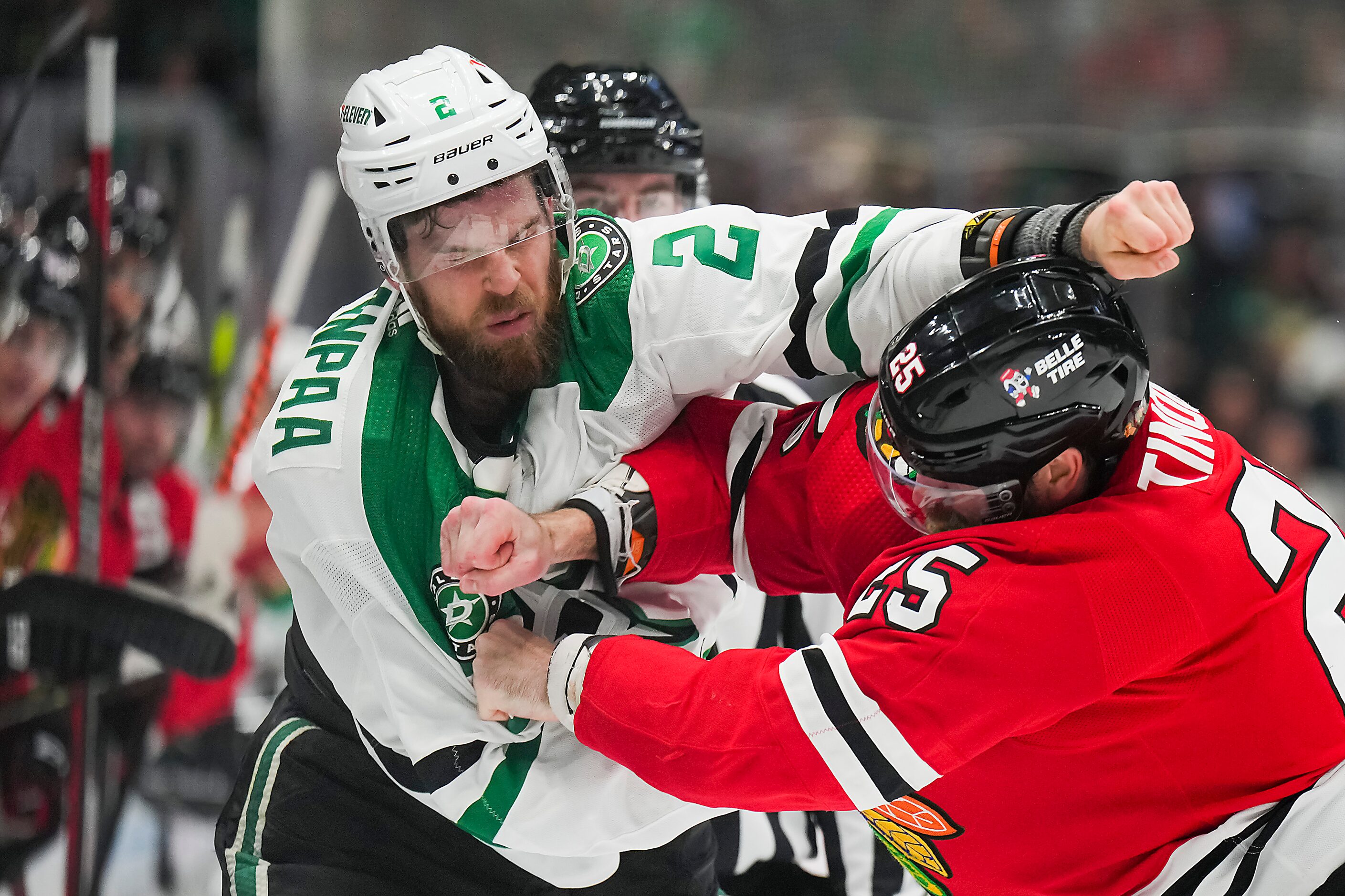 Dallas Stars defenseman Jani Hakanpaa (2) fights Chicago Blackhawks defenseman Jarred...