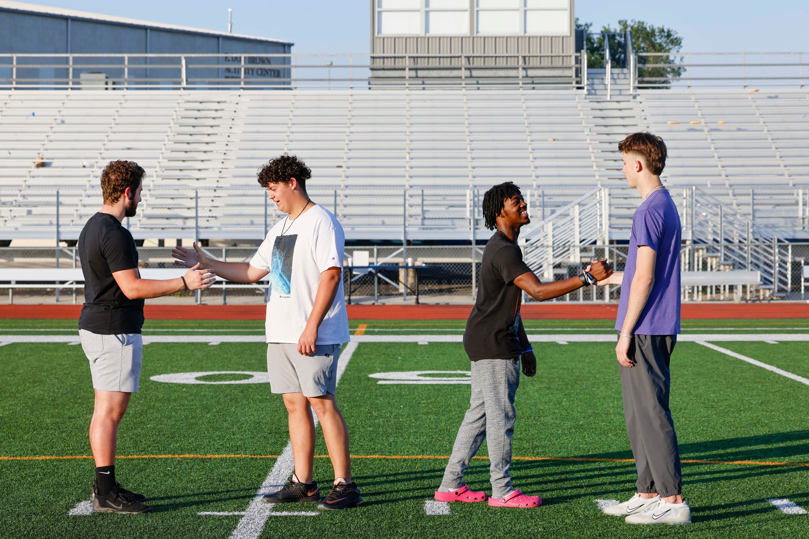 From left, L.D. Bell High School football players Evan Pomrenke, Matthew Garcia, Michael...