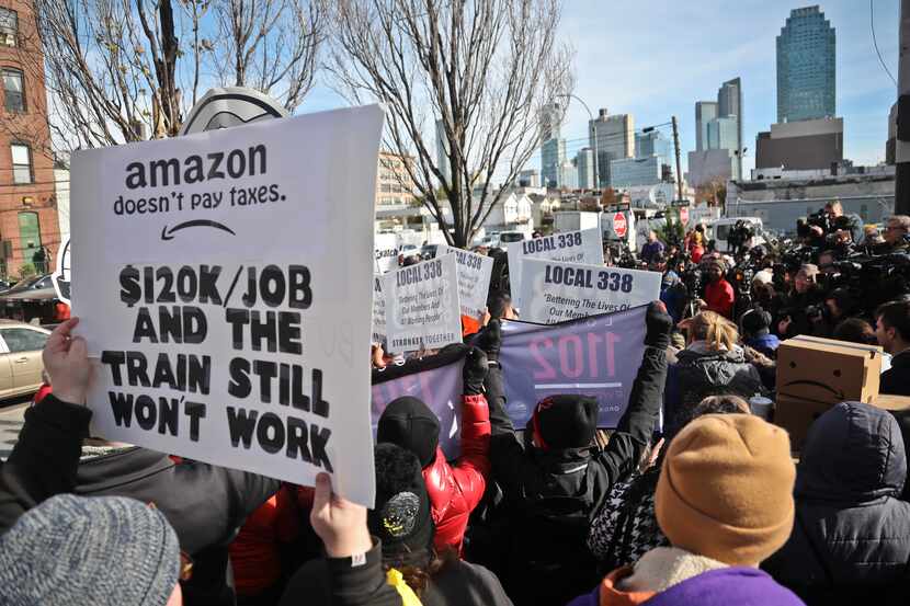 In Long Island City, N.Y., protesters objected to the huge tax breaks that Amazon will get...