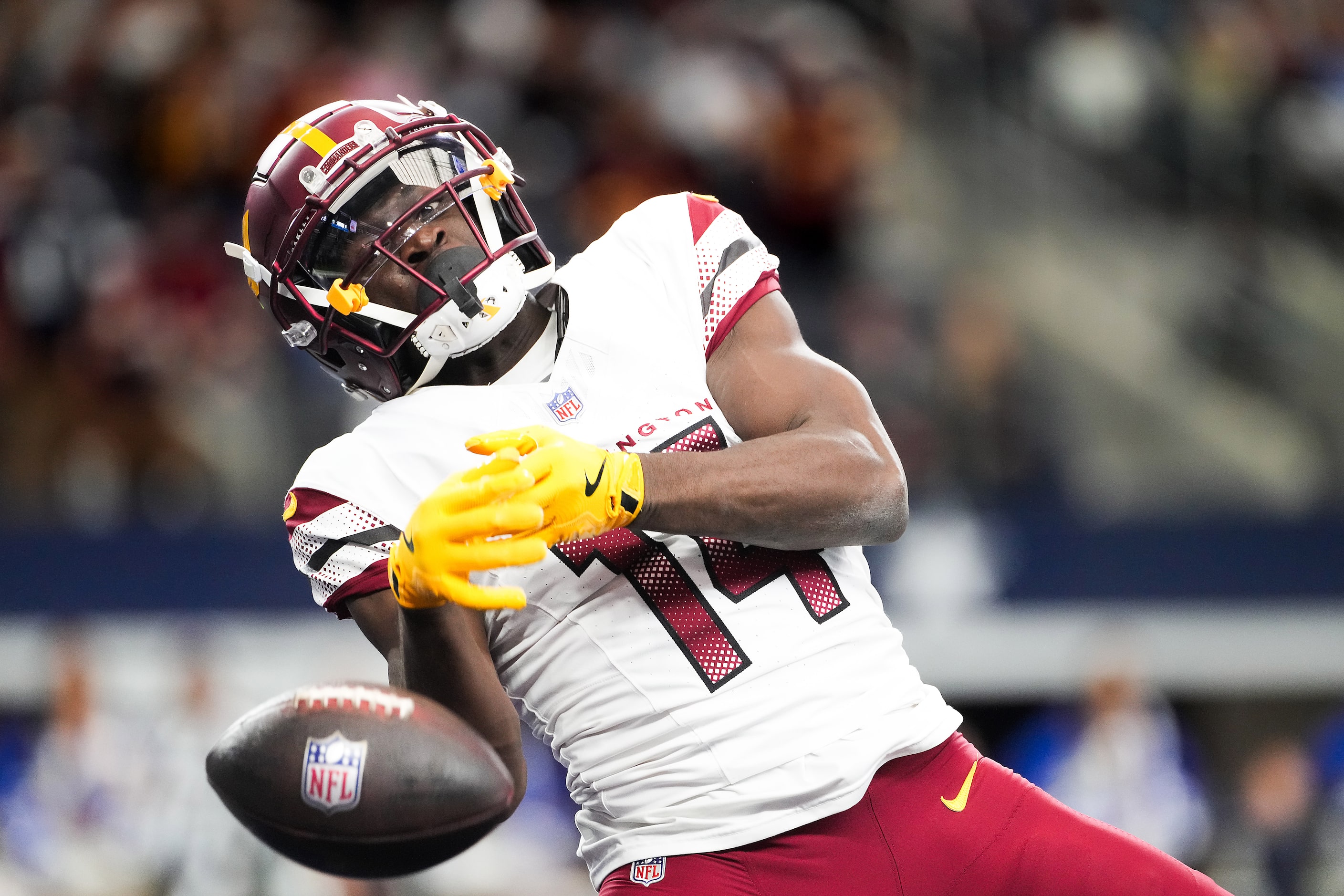 Washington Commanders wide receiver Olamide Zaccheaus drops a wide-open pass in the end zone...