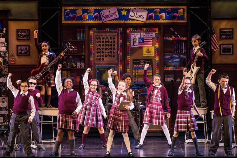 The  cast  performs in the  national tour of School  of  Rock, presented by Dallas Summer...