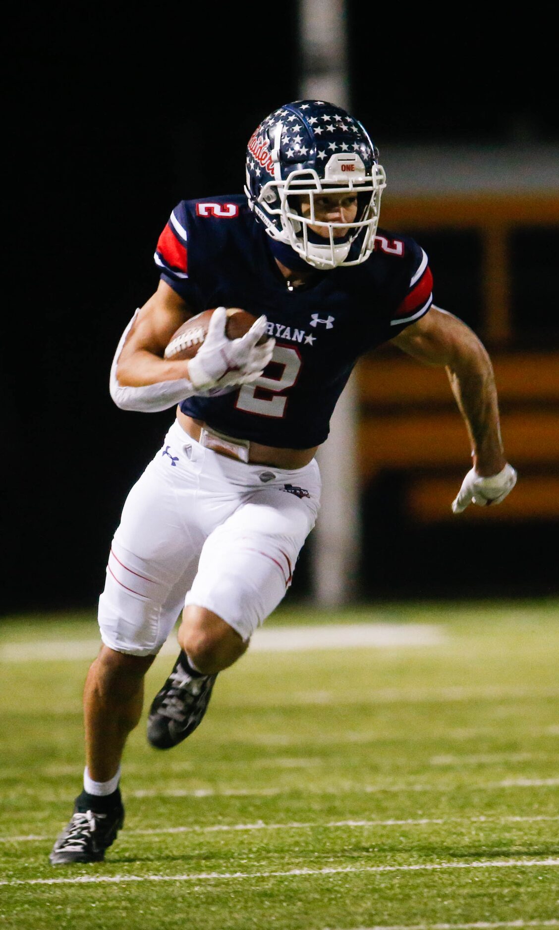 Denton Ryan's Billy Bowman Jr. (2) runs the ball during the second quarter of a football...