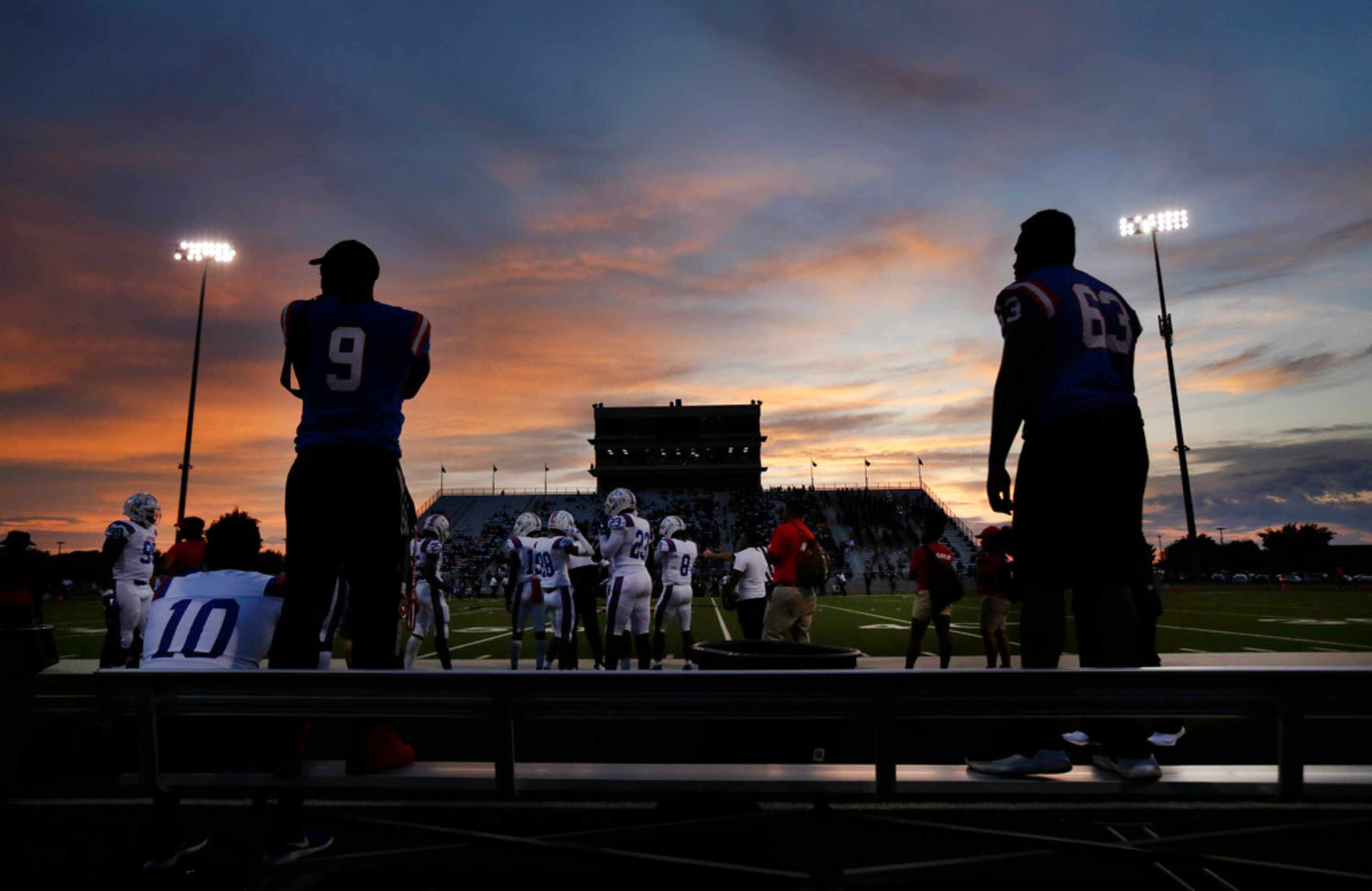 As the sun sets at Beverly D. Humphrey Tiger Stadium in Lancaster Texas, injured Duncanville...