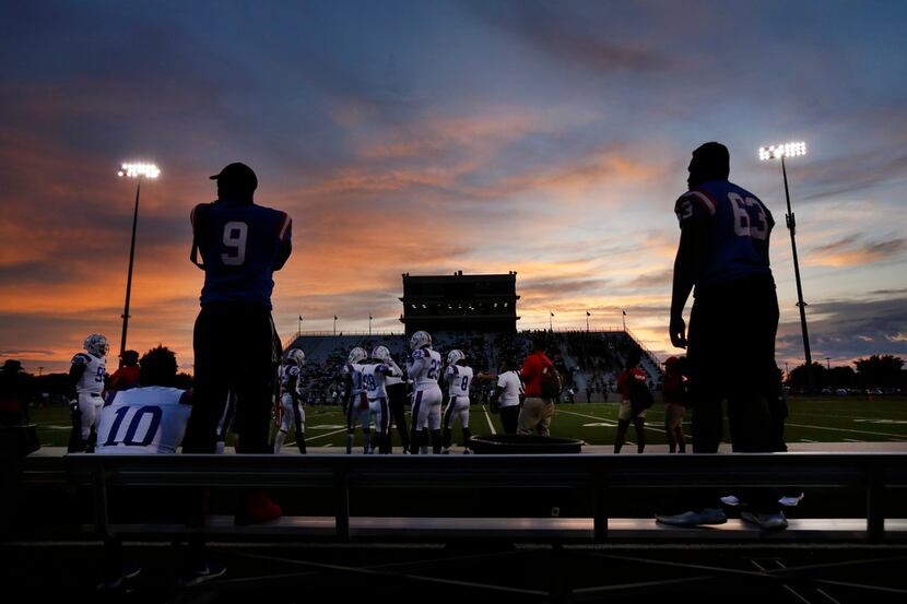 As the sun sets at Beverly D. Humphrey Tiger Stadium in Lancaster Texas, injured Duncanville...